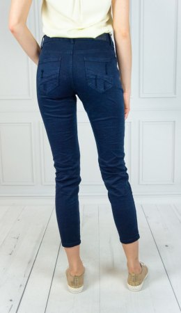 Granatowe jeansy z dziurami Moda Sanok