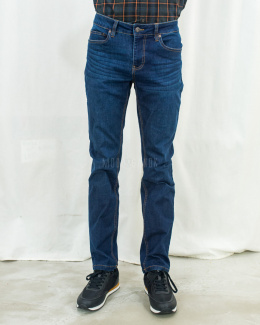 Męskie spodnie jeansowe w kolorze ciemnoniebieskim z efektem przetarcia na przodzie - MODA SANOK