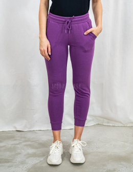 Dresowe spodnie z kieszeniami w kolorze fioletowym VOLCANO - MODA SANOK