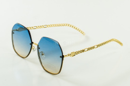 Okulary damskie przeciwsłoneczne duże w odcieniu niebieskiego ze złotymi elementami MODA SANOK