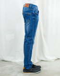 Męskie spodnie jeansy M. SARA w kolorze niebieskim z efektem przetarcia na kolanach - MODA SANOK