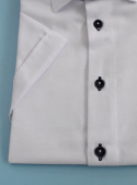 Biała koszula chłopięca z krótkim rękawem i granatowymi guzikami JANKES - MODA SANOK