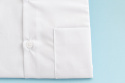 Chłopięca biała koszula z krótkim rękawem i kieszonką MIK - MODA SANOK