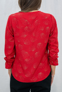 Elegancka czerwona bluzka w złote wzory  z długim rękawem i różą przy dekolcie - MODA SANOK