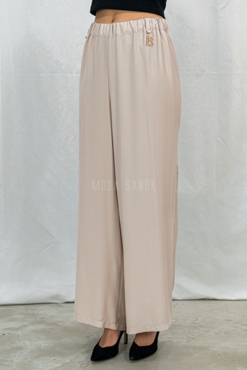 Letnie spodnie damskie z szeroką nogawką, lużne cienkie w kolorze beżowym CORALLINE -  MODA SANOK
