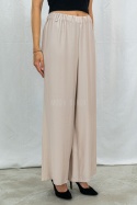 Letnie spodnie damskie z szeroką nogawką, lużne cienkie w kolorze beżowym CORALLINE -  MODA SANOK