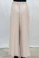 Letnie spodnie damskie z szeroką nogawką, lużne cienkie w kolorze beżowym CORALLINE -  MODA SANOK