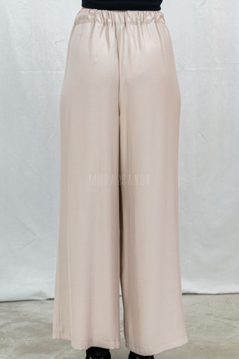 Letnie spodnie damskie z szeroką nogawką, lużne cienkie w kolorze beżowym CORALLINE -  MODA SANOK