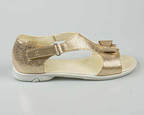 Sandały dziewczęce złote z kokardką zapinane na rzep KORNECKI-MODA SANOK