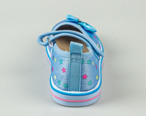Tenisówki dla dziewczynki niebieskie w kolorowe gwiazdki z kokardką z boku zapinane na rzep ATLETICO-MODA SANOK