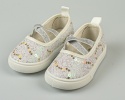 Tenisówki dziecięce białe wsuwane z gumeczkami ozdobione cekinkami - MODA SANOK