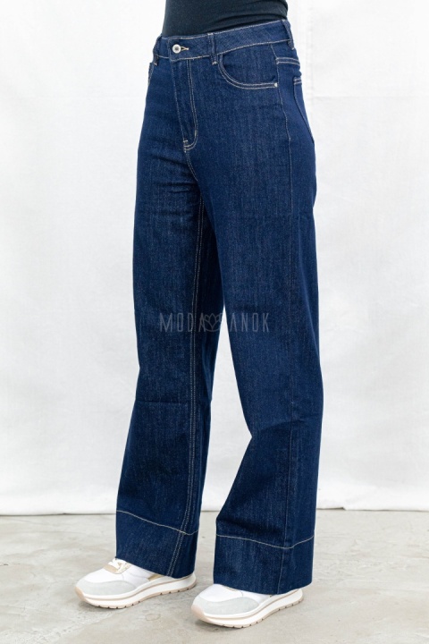 Damskie jeansowe spodnie z prostą szeroką nogawką w kolorze ciemnego granatu - MODA SANOK