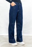 Damskie jeansowe spodnie z prostą szeroką nogawką w kolorze ciemnego granatu - MODA SANOK