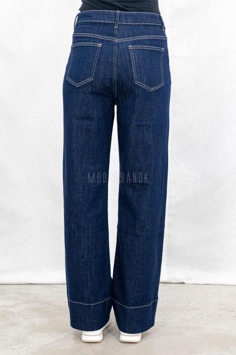 Damskie jeansowe spodnie z prostą szeroką nogawką w kolorze ciemnego granatu - MODA SANOK