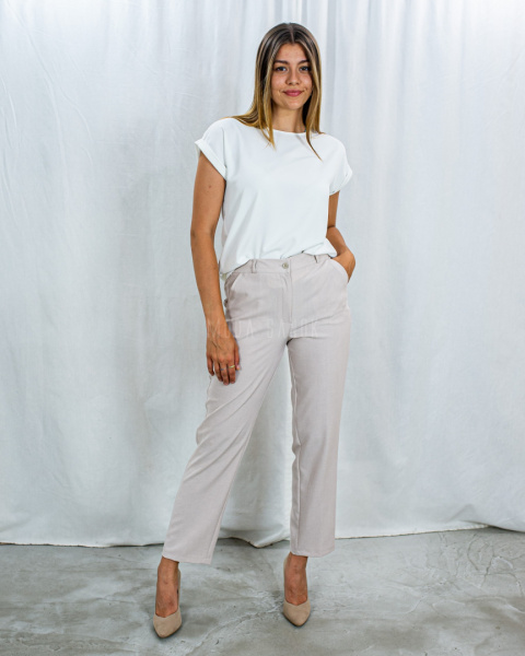 Eleganckie spodnie damskie, długie z gumą w pasie, cienkie w kolorze beżowym MTM - MODA SANOK