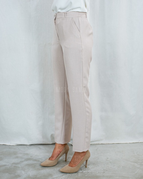 Eleganckie spodnie damskie, długie z gumą w pasie, cienkie w kolorze beżowym MTM - MODA SANOK