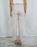 Eleganckie spodnie damskie, długie z gumą w pasie, cienkie w kolorze beżowym MTM - MODA SANOK